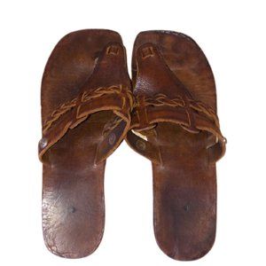 Brown leather flip flops
